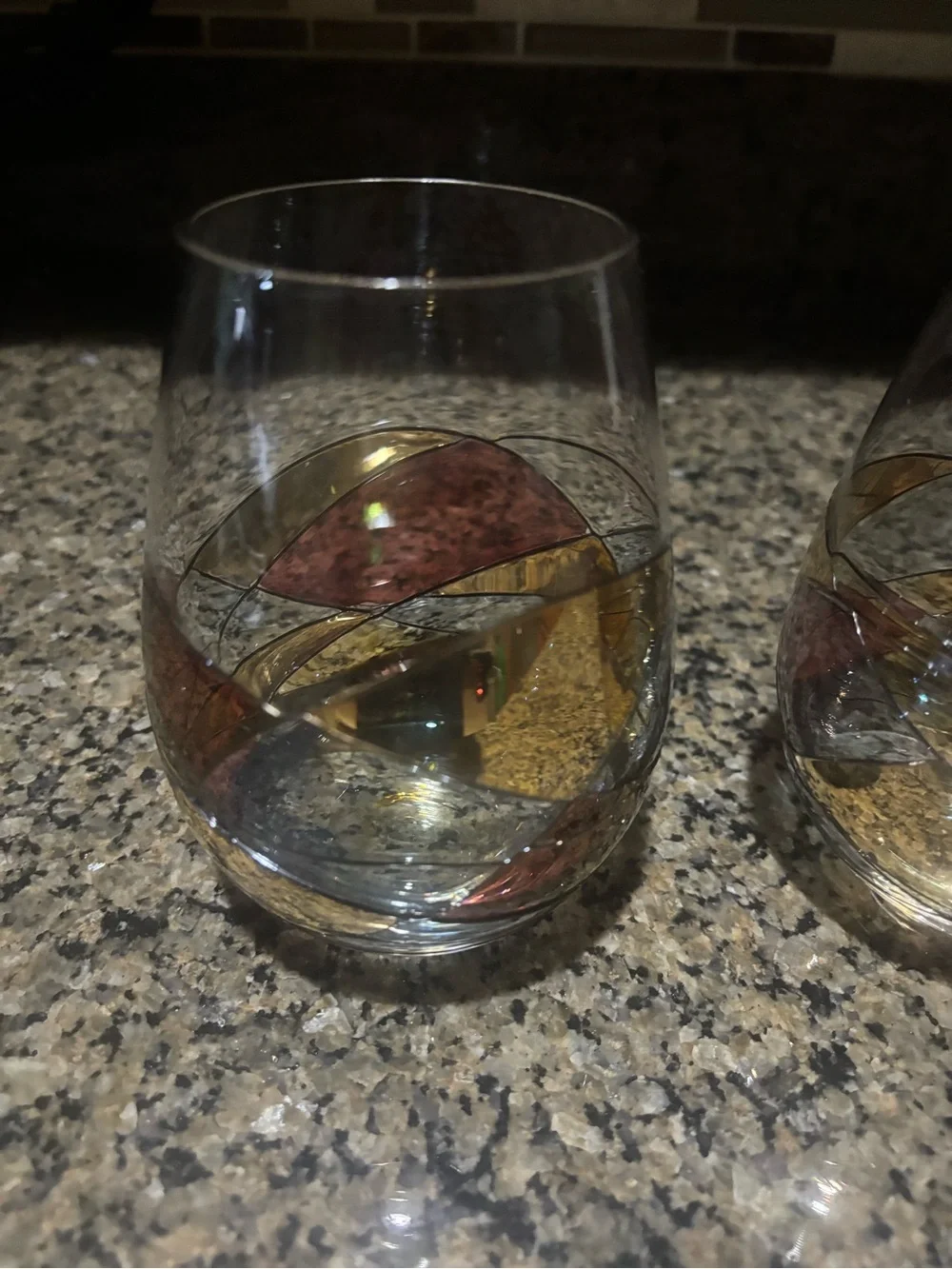 Cornet Barcelona Stemless Wine Glasses with Gold and Pink Swirl Accents